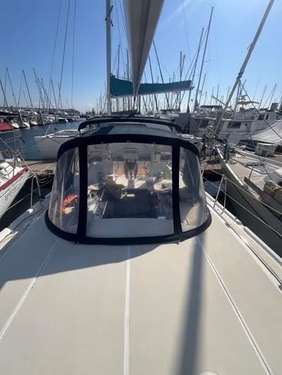 Pegasus Yacht Photos Pics 2015 Marlow-Hunter 40 sailboat docked in a marina under clear blue skies.