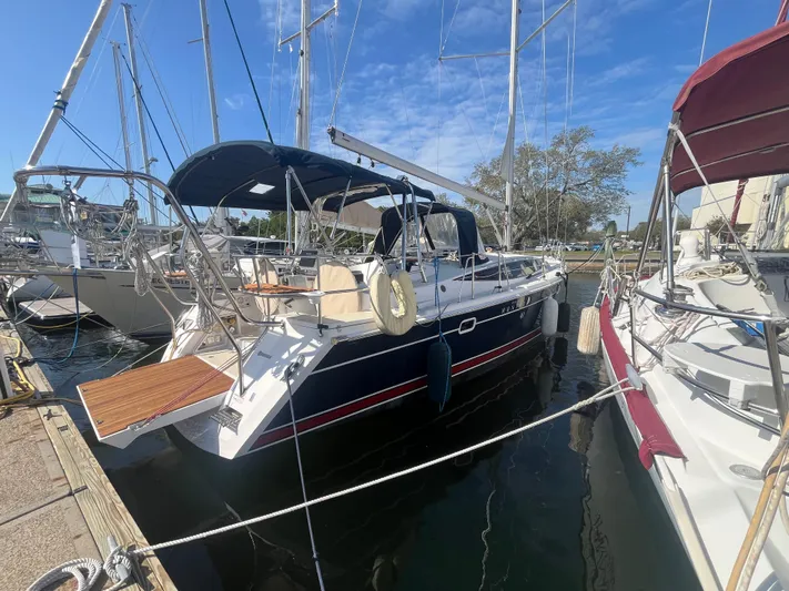 Pegasus Yacht Photos Pics 2015 Marlow-Hunter 40 sailboat docked at marina under clear blue sky.