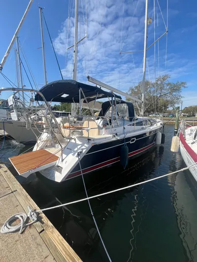 Pegasus Yacht Photos Pics 2015 Marlow-Hunter 40 sailboat docked at marina under clear blue sky.