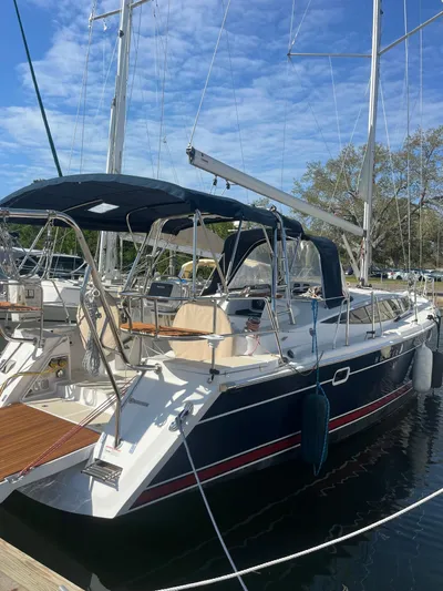 Pegasus Yacht Photos Pics 2015 Marlow-Hunter 40 sailboat docked in marina under clear blue sky.