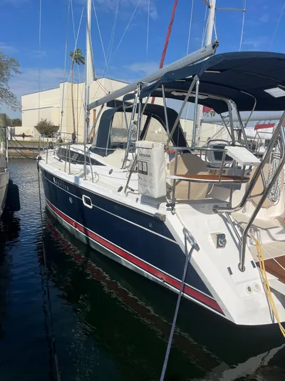 Pegasus Yacht Photos Pics 2015 Marlow-Hunter 40 sailboat docked in marina, featuring sleek design and blue hull.