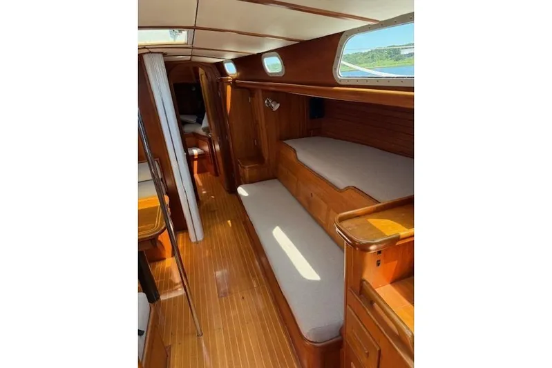 Statia Yacht Photos Pics Interior of 1994 Hinckley Sou'wester 42 Sloop with wooden finish and cozy seating.