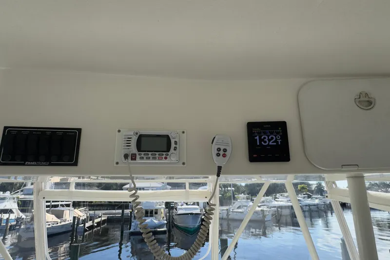  Yacht Photos Pics 2004 Silverton 38 Convertible boat dashboard with navigation and communication equipment.