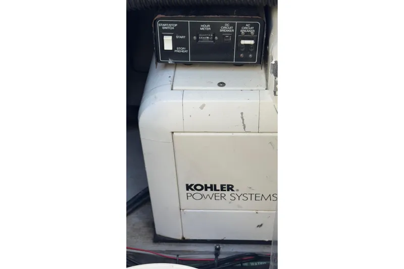  Yacht Photos Pics Kohler power system on 2004 Silverton 38 Convertible boat, featuring control panel and switches.