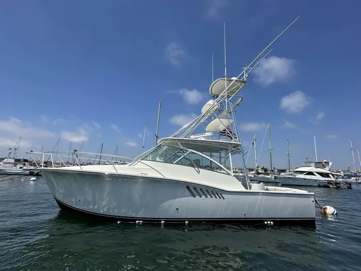 Squid Inc Yacht Photos Pics 2007 Albemarle 360 Express boat docked in marina under clear blue sky.