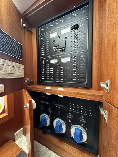 Squid Inc Yacht Photos Pics Electrical panel inside 2007 Albemarle 360 Express boat, featuring switches and controls.