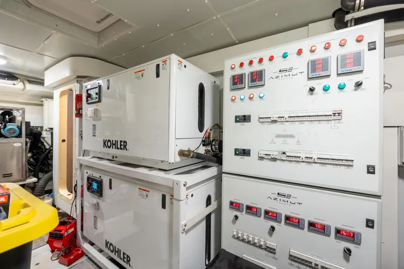  Yacht Photos Pics Engine room of 2023 Azimut S8 yacht with Kohler generators and control panels.