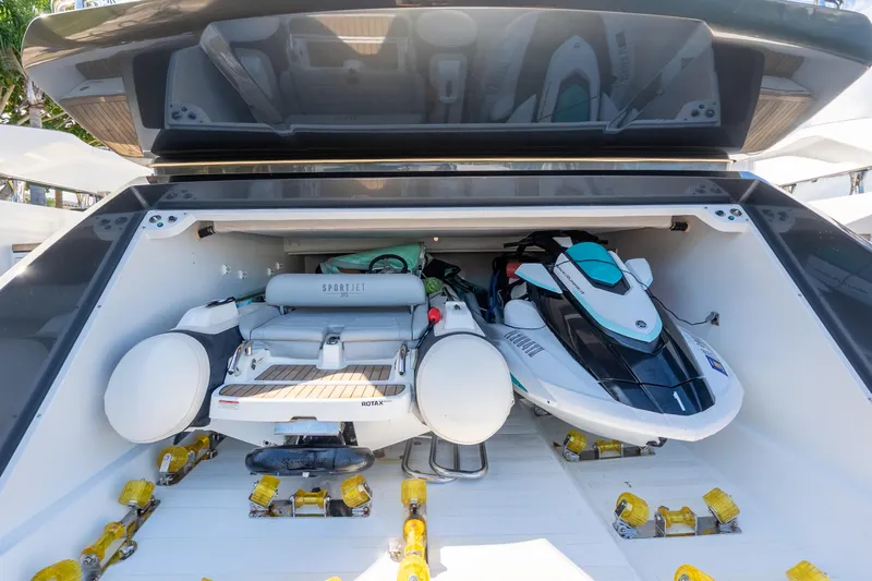  Yacht Photos Pics 2023 Azimut S8 yacht garage with jet ski and inflatable boat storage.