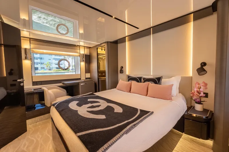  Yacht Photos Pics Luxurious bedroom interior of 2023 Azimut S8 yacht with modern decor and elegant lighting.