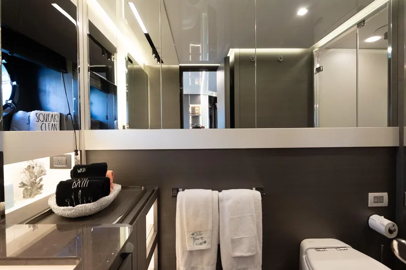  Yacht Photos Pics Luxurious bathroom interior of 2023 Azimut S8 yacht, featuring modern design and elegant amenities.