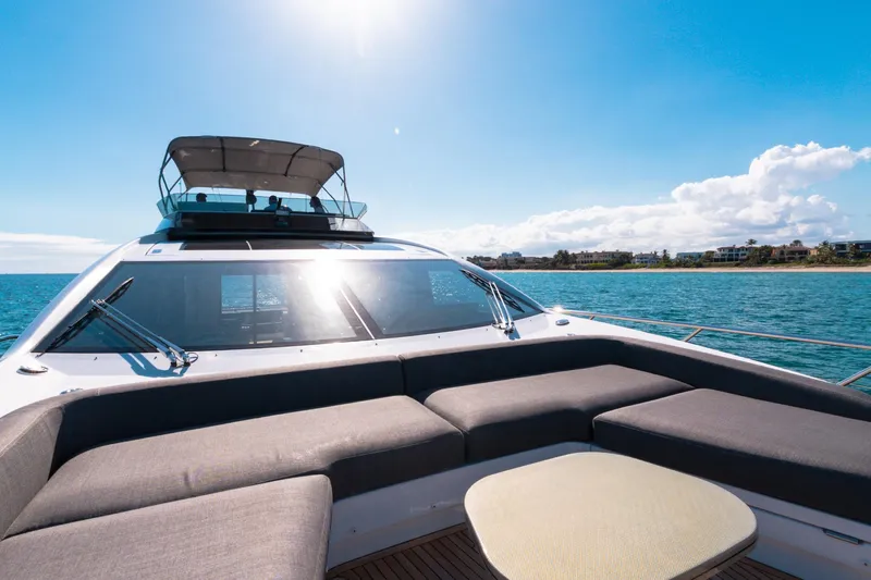  Yacht Photos Pics Luxurious 2023 Azimut S8 yacht with spacious deck, cruising on clear blue waters.