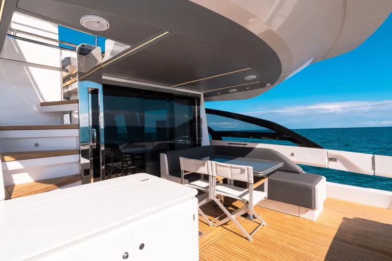  Yacht Photos Pics Luxurious 2023 Azimut S8 yacht deck with modern seating and ocean view.