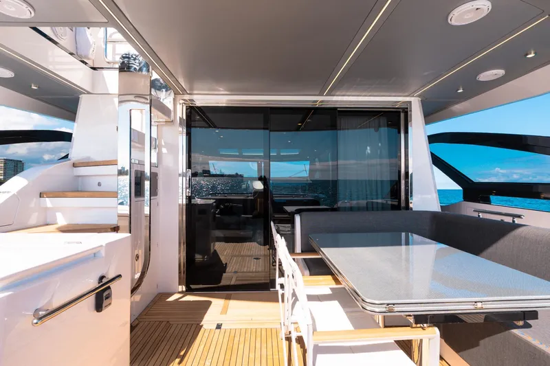 Yacht Photos Pics Luxurious 2023 Azimut S8 yacht deck with modern seating and ocean view.