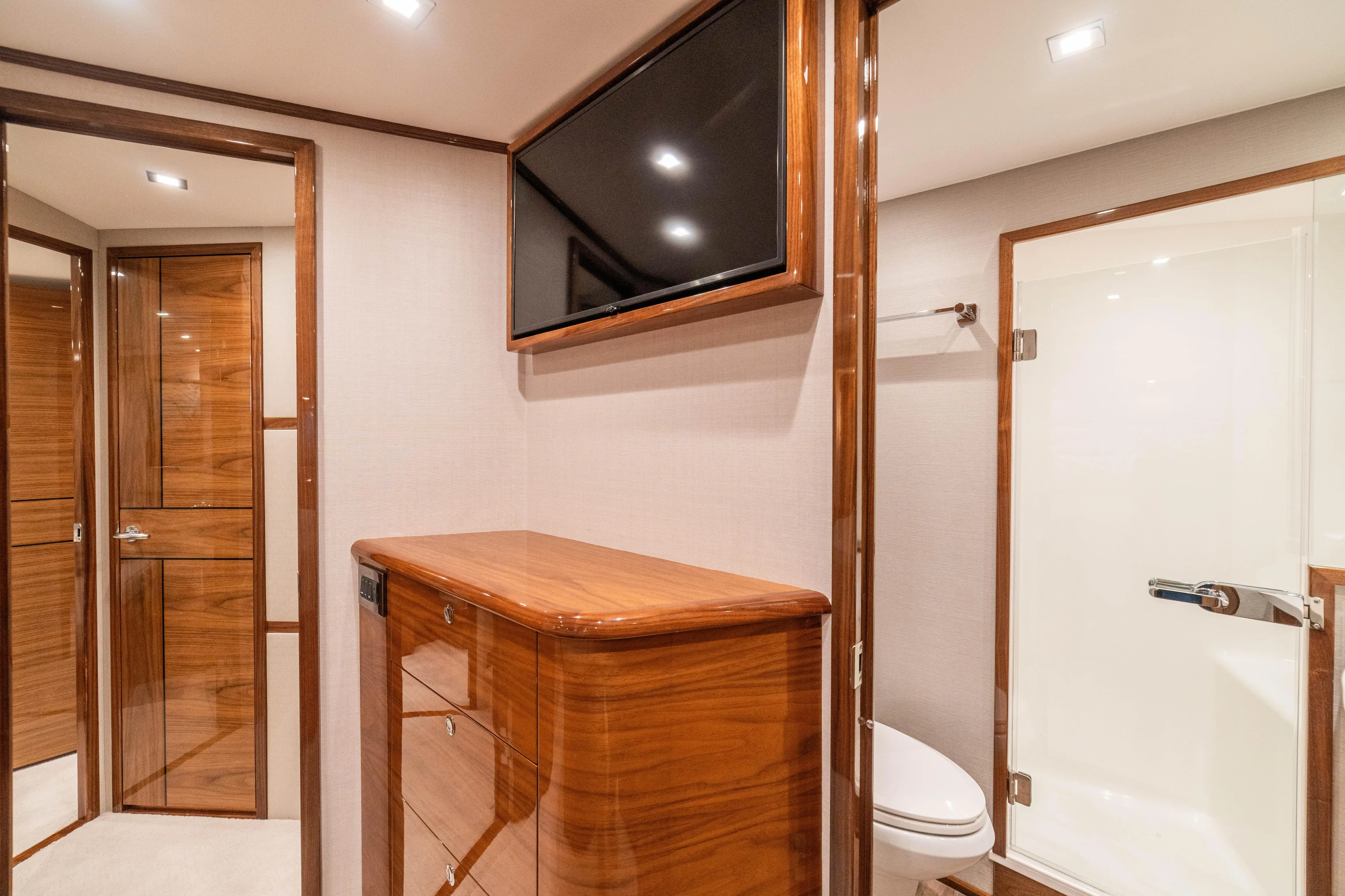 New Viking 64 Convertible Yacht Photos Pics Luxurious interior of 2026 Viking 64 Convertible yacht with wood finishes and modern amenities.