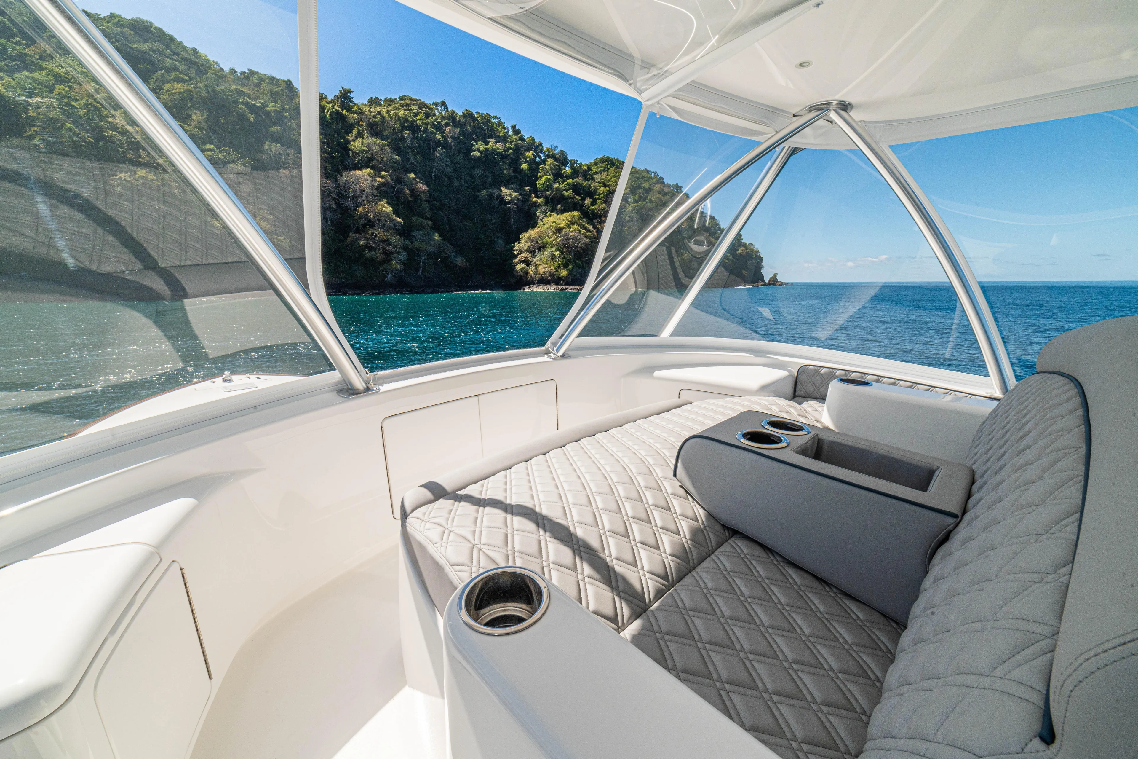 New Viking 64 Convertible Yacht Photos Pics Luxurious interior of 2026 Viking 64 Convertible yacht with ocean view.