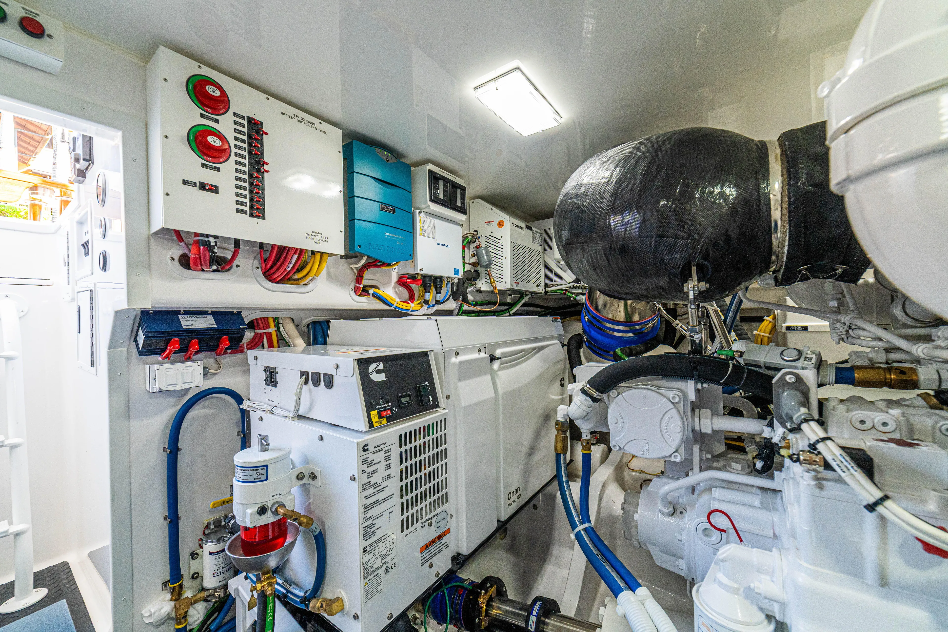 New Viking 64 Convertible Yacht Photos Pics Engine room of 2026 Viking 64 Convertible yacht, showcasing advanced machinery and wiring.