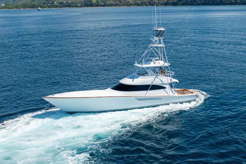 New Viking 64 Convertible Yacht Photos Pics 2026 Viking 64 Convertible yacht cruising on open water.