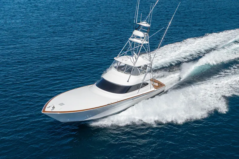 New Viking 64 Convertible Yacht Photos Pics 2026 Viking 64 Convertible yacht cruising on open blue water.