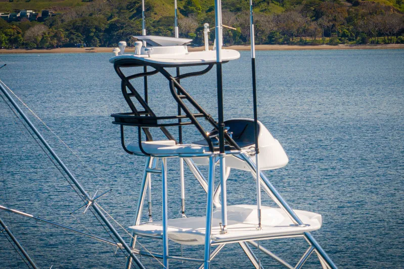 New Viking 64 Convertible Yacht Photos Pics Tower of 2026 Viking 64 Convertible yacht against scenic water backdrop.