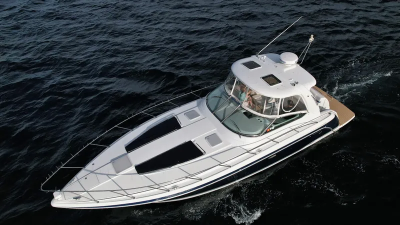 40 Formula Pc / Twin Yanmar / No Pods Yacht Photos Pics 2006 Formula 40 PC yacht cruising on open water, aerial view.