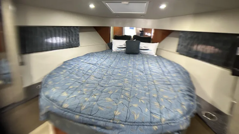 40 Formula Pc Yacht Photos Pics Luxurious cabin interior of a 2006 Formula 40 PC yacht with a spacious bed.