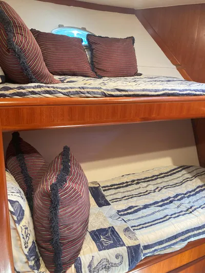 Raiders Yacht Photos Pics Bunk beds in 1988 Viking 70 Cockpit Motor Yacht cabin.