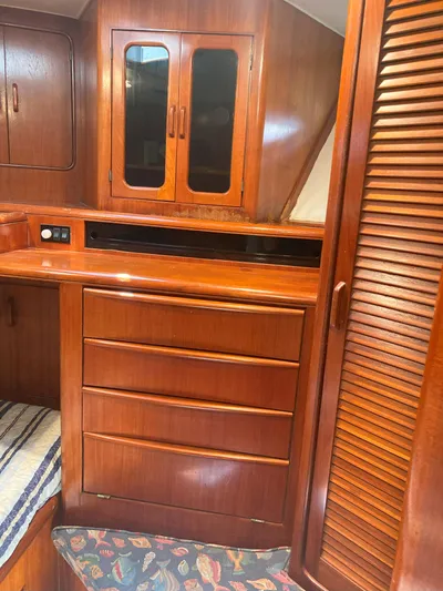 Raiders Yacht Photos Pics Interior cabin of a 1988 Viking 70 Cockpit Motor Yacht with wooden cabinetry.
