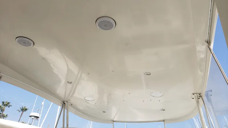 Happy Ours Yacht Photos Pics Ceiling view of 2007 Marquis 55 LS yacht with built-in lights and speakers.