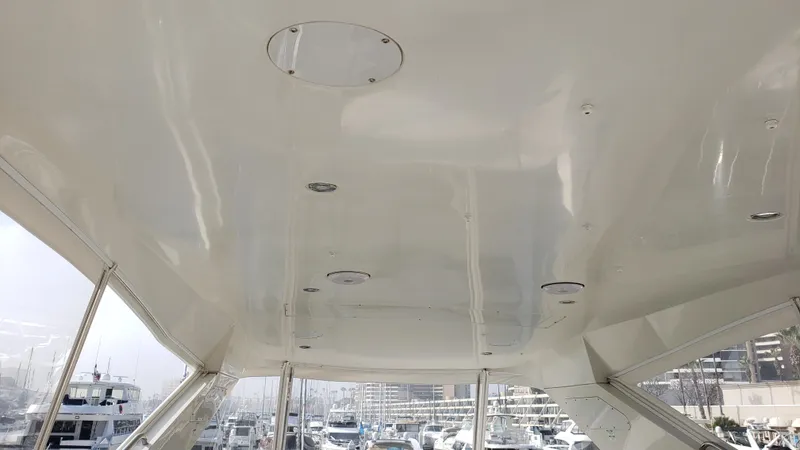Happy Ours Yacht Photos Pics Interior view of a 2007 Marquis 55 LS yacht ceiling with recessed lighting.