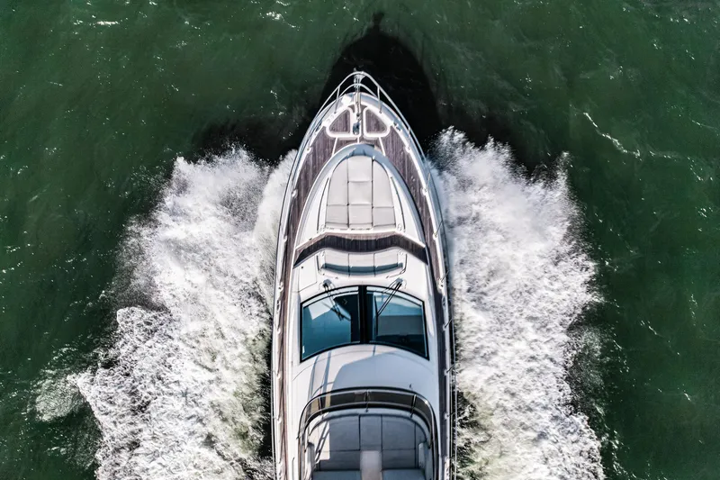 Yan Ge Yacht Photos Pics Aerial view of 2018 Sea Ray L590 Fly yacht cruising through water.