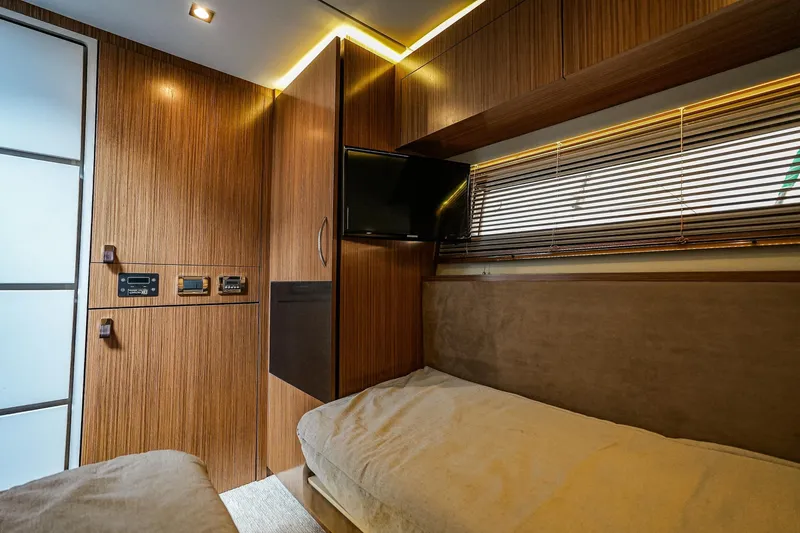 Yan Ge Yacht Photos Pics Luxurious 2018 Sea Ray L590 Fly cabin interior with wood paneling and modern amenities.