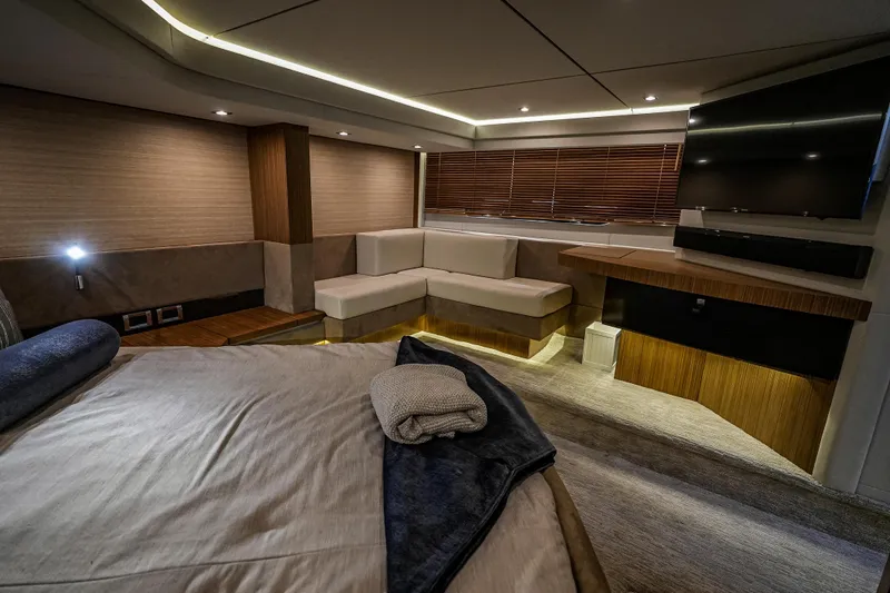 Yan Ge Yacht Photos Pics Luxurious interior of 2018 Sea Ray L590 Fly yacht with modern furnishings and ambient lighting.