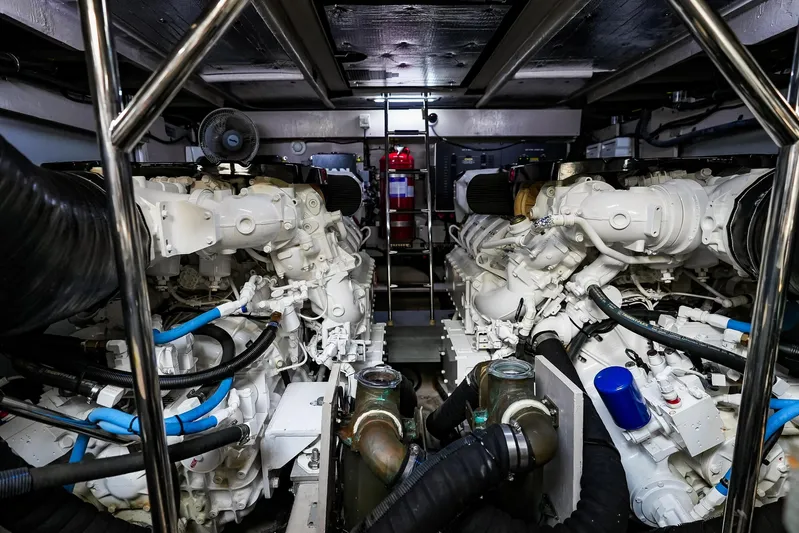 Yan Ge Yacht Photos Pics Engine room of 2018 Sea Ray L590 Fly yacht, showcasing dual engines and mechanical components.