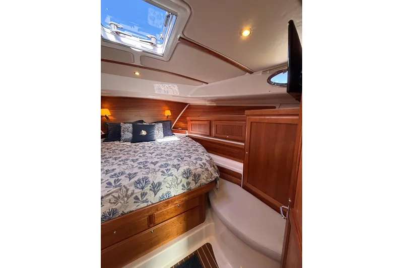 Luna Yacht Photos Pics Luxurious cabin interior of 2020 Back Cove 37 yacht with elegant wood finish.