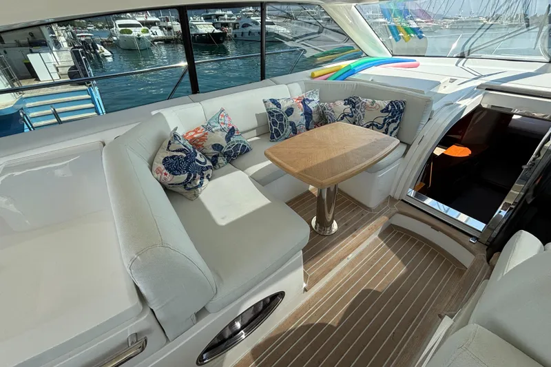  Yacht Photos Pics Luxurious 2006 Princess V53 yacht interior with elegant seating and decorative cushions.