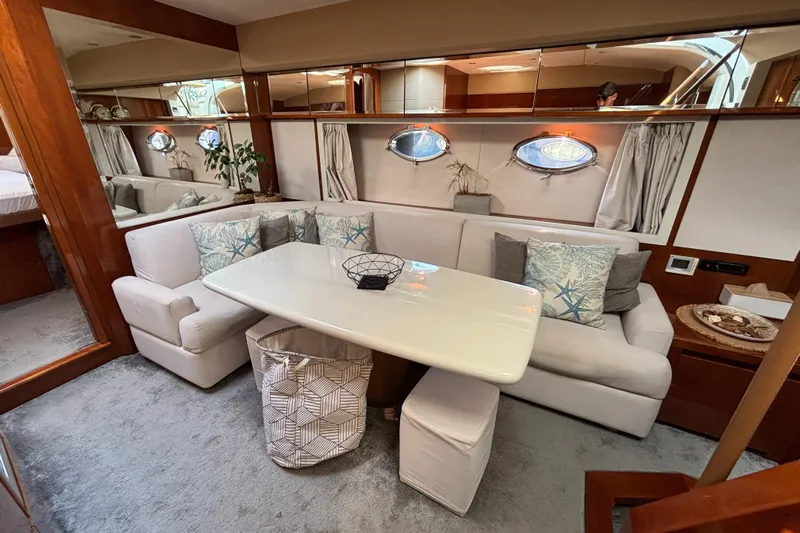  Yacht Photos Pics Luxurious interior of a 2006 Princess V53 yacht with elegant seating and decor.