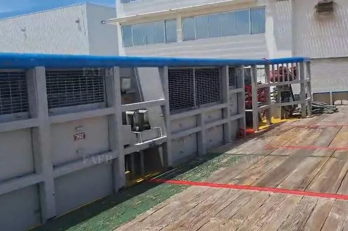  Yacht Photos Pics Industrial loading dock with custom equipment, 2009 design, featuring safety barriers and wooden flooring.