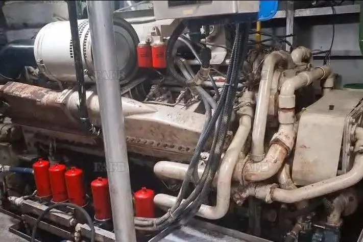  Yacht Photos Pics Large industrial engine with red filters and complex piping, custom model from 2009.