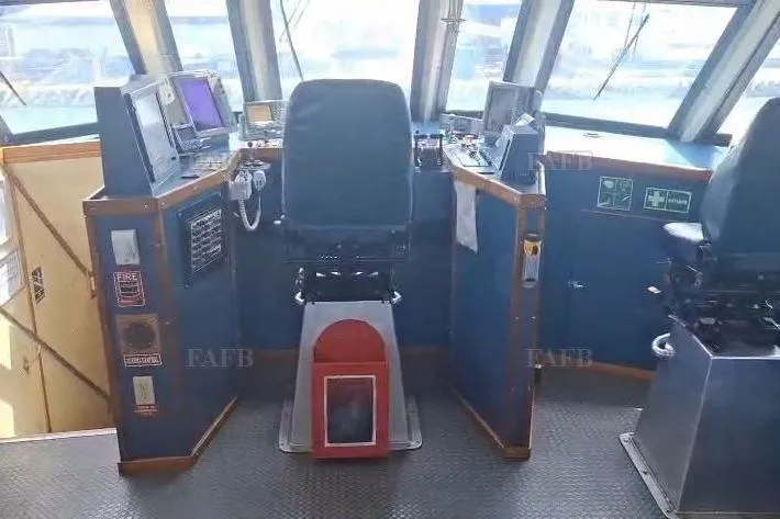  Yacht Photos Pics Control room of a custom 2009 vessel with navigation equipment and captain's chair.