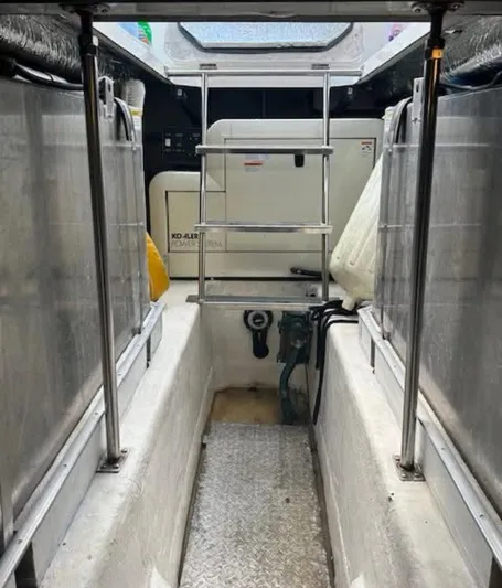  Yacht Photos Pics 2000 Carver 450 Voyager Pilothouse interior with ladder and equipment.