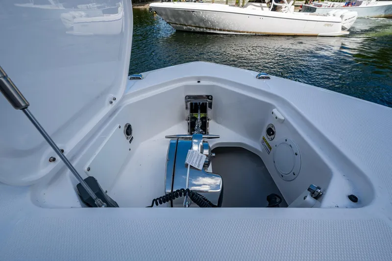  Yacht Photos Pics Open anchor compartment of 2020 Everglades 395 Center Console boat on water.