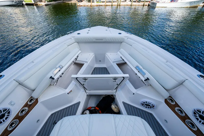  Yacht Photos Pics 2020 Everglades 395 Center Console boat interior with seating and storage compartments.
