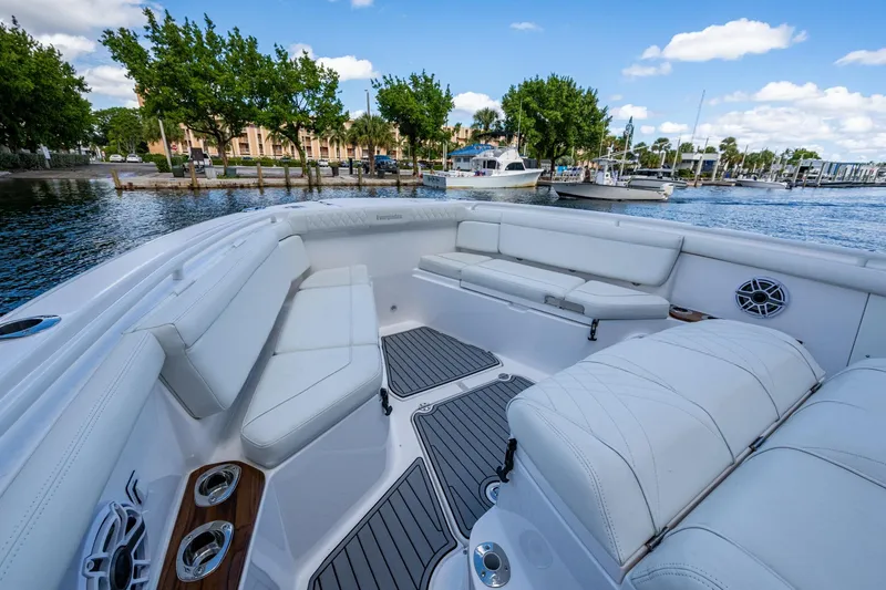  Yacht Photos Pics Luxurious seating on 2020 Everglades 395 Center Console boat, docked by marina.