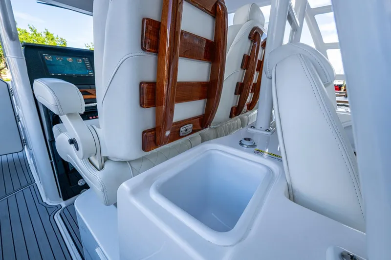  Yacht Photos Pics 2020 Everglades 395 Center Console interior with luxurious seating and modern dashboard.