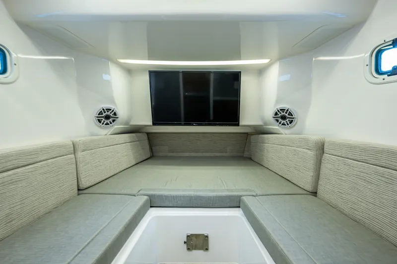  Yacht Photos Pics Interior of 2020 Everglades 395 Center Console with seating and TV.