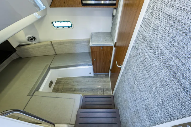  Yacht Photos Pics Interior of 2020 Everglades 395 Center Console with modern seating and cabinetry.