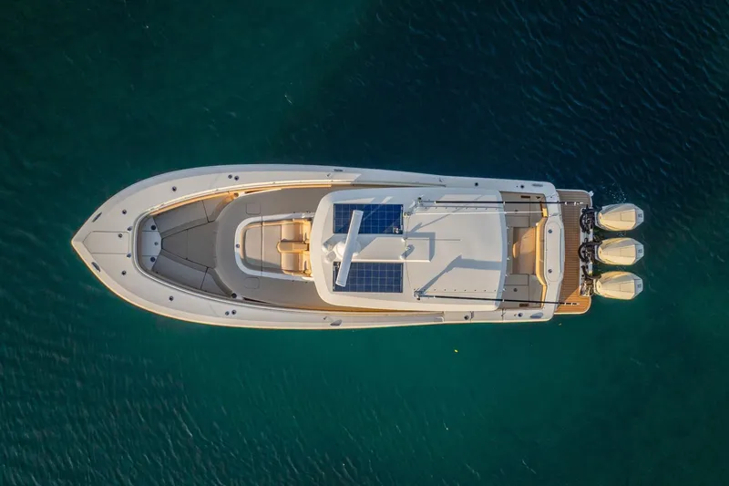  Yacht Photos Pics Top view of 2020 Scout 355 LXF boat with solar panels and triple engines.