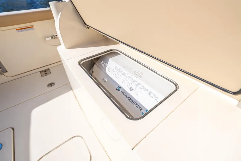  Yacht Photos Pics 2020 Scout 355 LXF boat featuring Seakeeper stabilizer system.