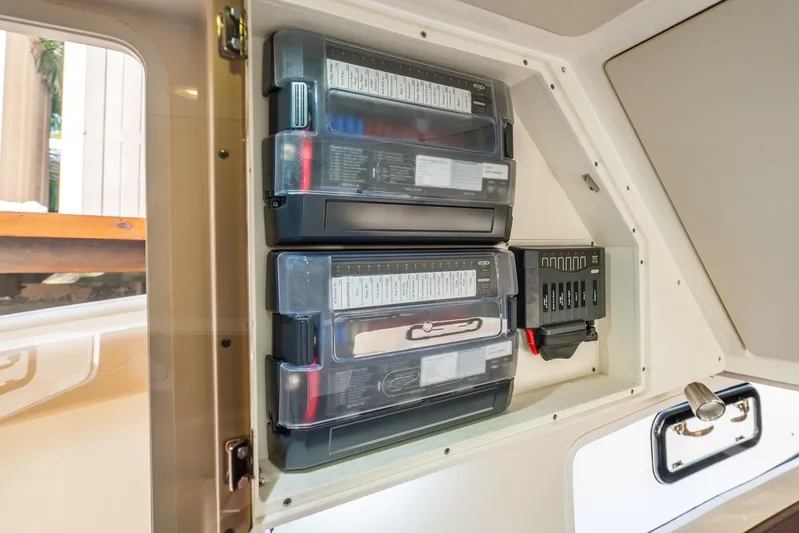  Yacht Photos Pics Electrical panel inside 2020 Scout 355 LXF boat, showcasing organized wiring and components.