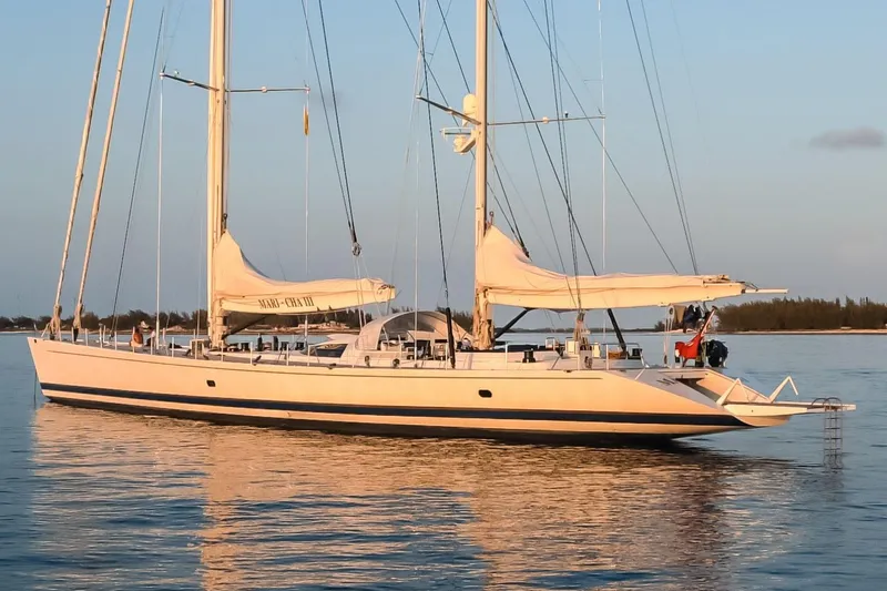 Mari Cha III Yacht Photos Pics Elegant 1997 Sensation Yacht Custom sailing on calm waters at sunset.
